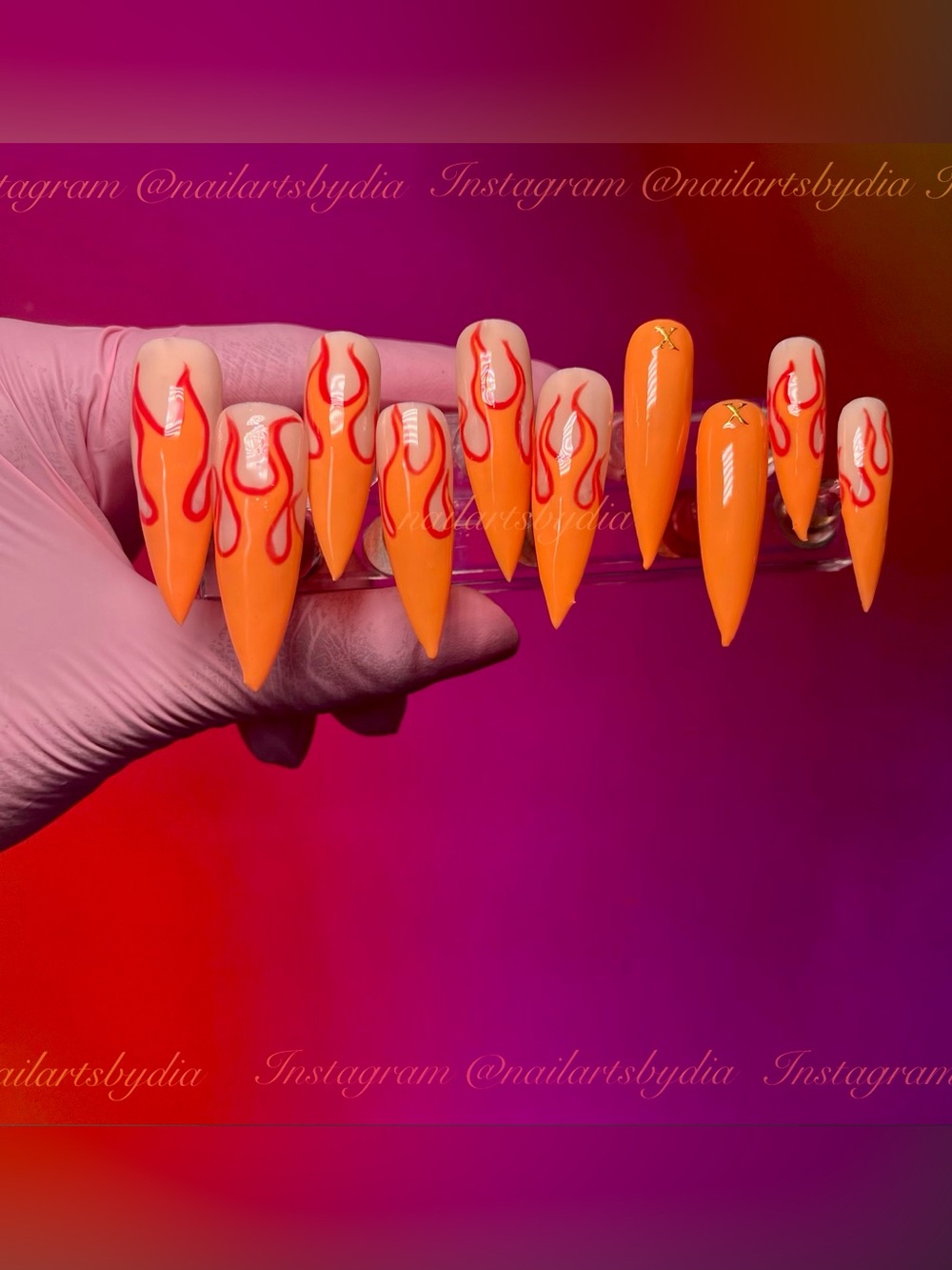 Neon Orange Stiletto Nail Set with Red Flame Art